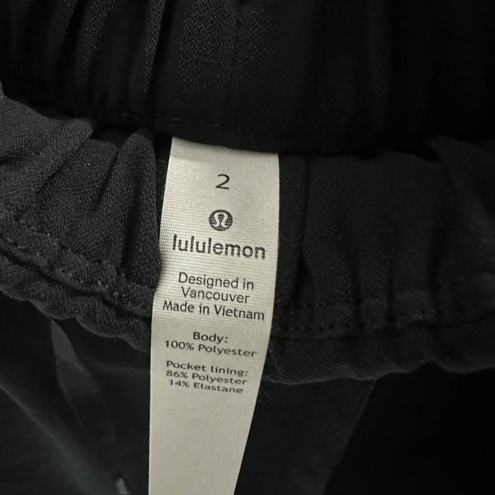 Lululemon Athletic On The Fly Skirt Black Drawstring Pockets Women's 2 Tennis